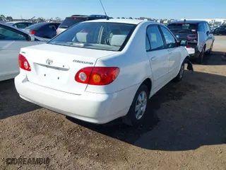 2004 Toyota Corolla CE with VIN 1NXBR32E04Z278447, listed as a IAAI auction lot 41653492 with 96,422 mi miles. Bid and sale history available at carsss.com. Image 4.