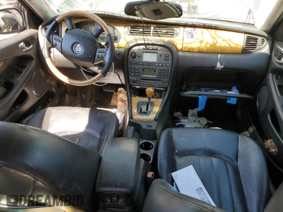 2004 Jaguar X-Type with VIN SAJEA51C04WD91344, listed as a Copart auction lot 49979285 with Not Provided miles and Salvage Title. Bid and sale history available at DreamBid. Image 8.