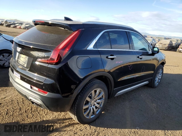 2020 Cadillac XT4 AWD Premium Luxury with VIN 1GYFZDR49LF032597, listed as a Copart auction lot 88595595 with 82,324 mi miles and Salvage title. Bid and sale history available at DreamBid. Image 3.