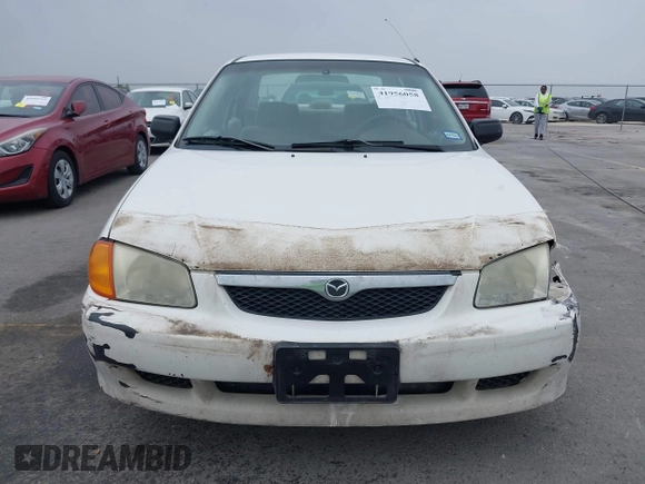 2000 Mazda Protege DX with VIN JM1BJ2220Y0273953, listed as a IAAI auction lot 41956058 with 158,837 mi miles and . Bid and sale history available at DreamBid. Image 12.