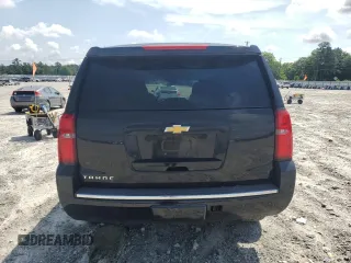 2015 Chevrolet Tahoe LTZ with VIN 1GNSCCKC2FR693500, listed as a Copart auction lot 60225195 with 206,210 mi miles and Salvage title. Bid and sale history available at DreamBid. Image 6.