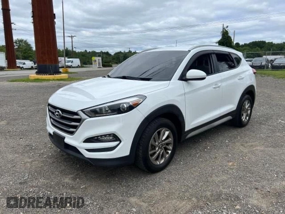 2018 Hyundai Tucson SEL z VIN KM8J33A40JU676727, wystawiony jako Copart lot #87532055 z przebiegiem 128 554 mil mil oraz Czysty tytuł • Clean title. Historia ofert i sprzedaży dostępna na DreamBid. Obrazek 2.