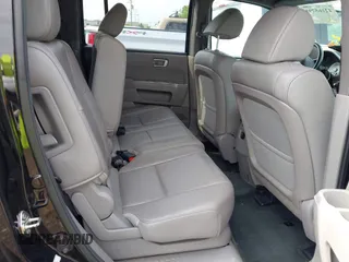 2014 Honda Pilot EX-L with VIN 5FNYF4H5XEB011816, listed as a IAAI auction lot 42165791 with 118,366 mi miles and . Bid and sale history available at carsss.com. Image 8.