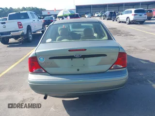 2003 Ford Focus SE with VIN 1FAFP34P13W304346, listed as a IAAI auction lot 42706827 with 239,800 mi miles and . Bid and sale history available at DreamBid. Image 16.