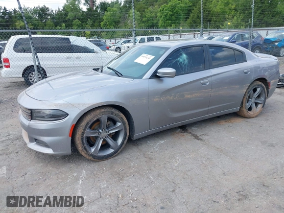 2015 Dodge Charger SXT with VIN 2C3CDXHG2FH768681, listed as a IAAI auction lot 39939245 with Not Provided miles and . Bid and sale history available at DreamBid. Image 2.