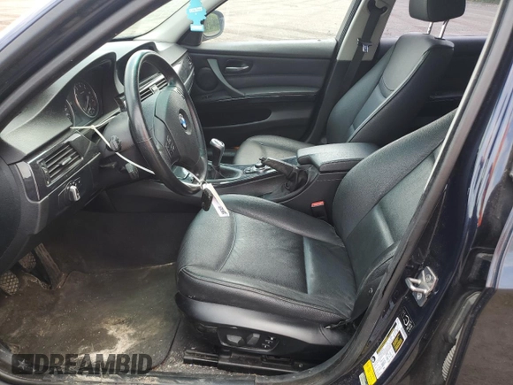 2009 BMW 3 Series 328i with VIN WBAPH73569A171010, listed as a Copart auction lot 61923715 with 209,062 mi miles and Salvage title. Bid and sale history available at DreamBid. Image 7.