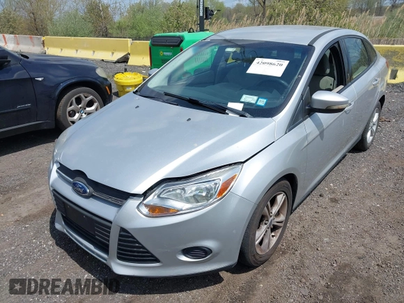 2013 Ford Focus SE with VIN 1FADP3F28DL307076, listed as a IAAI auction lot 42098620 with 182,555 mi miles. Bid and sale history available at carsss.com. Image 2.