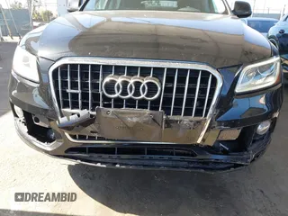 2015 Audi Q5 Premium Plus z VIN WA1LFAFP0FA013351, wystawiony jako IAAI lot #42537653 z przebiegiem 98 842 mil mil oraz . Historia ofert i sprzedaży dostępna na DreamBid. Obrazek 6.