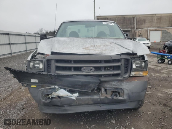 2002 Ford F-350 XL with VIN 1FTSF31F12EB21069, listed as a Copart auction lot 84287374 with 110,890 mi miles and Salvage Title. Bid and sale history available at DreamBid. Image 5.