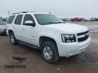 2007 Chevrolet Tahoe LTZ with VIN 1GNFC13017R275263, listed as a IAAI auction lot 42151951 with 210,574 mi miles and . Bid and sale history available at DreamBid. Image 1.