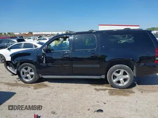 2013 Chevrolet Suburban LT with VIN 1GNSCJE0XDR255326, listed as a IAAI auction lot 41969643 with 176,494 mi miles. Bid and sale history available at carsss.com. Image 14.