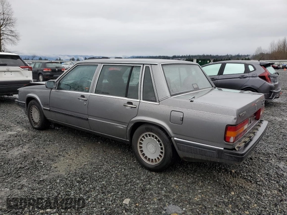 1990 Volvo 760 with VIN YV1GA8740L0089828, listed as a Copart auction lot 84668844 with 272,600 mi miles and Salvage title. Bid and sale history available at DreamBid. Image 2.
