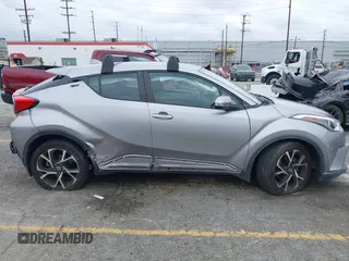 2018 Toyota C-HR XLE with VIN NMTKHMBX8JR032422, listed as a IAAI auction lot 42038240 with 132,553 mi miles and . Bid and sale history available at DreamBid. Image 13.