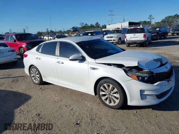 2016 Kia Optima LX with VIN 5XXGT4L36GG005859, listed as a IAAI auction lot 41053277 with 127,783 mi miles. Bid and sale history available at carsss.com. Image 13.
