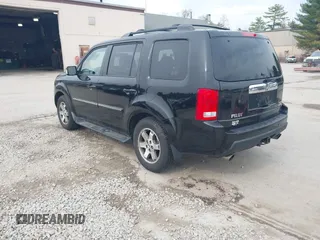 2009 Honda Pilot Touring with VIN 5FNYF48969B055806, listed as a IAAI auction lot 42138651 with 253,623 mi miles and . Bid and sale history available at carsss.com. Image 3.