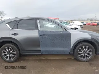 2017 Mazda CX-5 Grand Touring with VIN JM3KFBDL3H0143194, listed as a IAAI auction lot 42049258 with 74,159 mi miles. Bid and sale history available at carsss.com. Image 13.