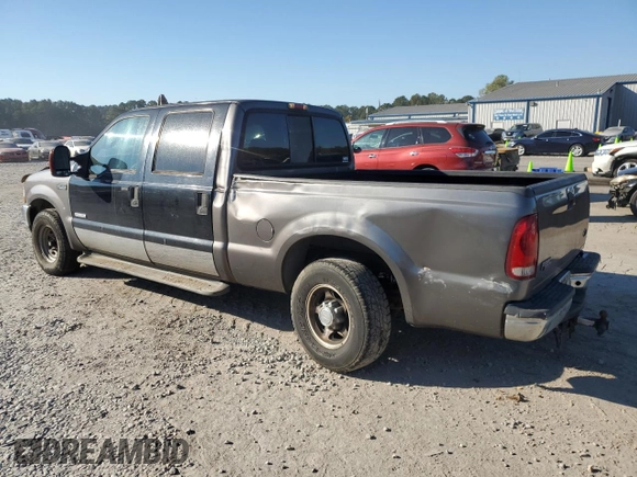 2003 Ford Super Duty F-250 XL with VIN 1FTNW20F73EB02536, listed as a Copart auction lot 77330394 with 170,102 mi miles and Salvage Title. Bid and sale history available at carsss.com. Image 2.