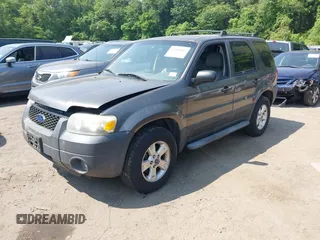 2005 Ford Escape XLT with VIN 1FMYU93155KA87661, listed as a IAAI auction lot 42491447 with 142,287 mi miles and . Bid and sale history available at DreamBid. Image 2.