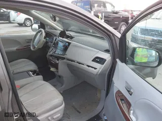 2013 Toyota Sienna XLE AAS with VIN 5TDYK3DC1DS396526, listed as a IAAI auction lot 41734256 with 218,723 mi miles. Bid and sale history available at carsss.com. Image 5.