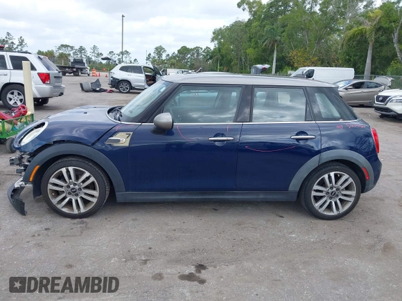 2017 MINI Hardtop 4 Door Cooper with VIN WMWXU1C54H2E19114, listed as a IAAI auction lot 42107266 with 83,524 mi miles and . Bid and sale history available at DreamBid. Image 15.