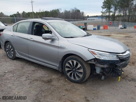 2017 Honda Accord Hybrid Touring with VIN JHMCR6F75HC016374, listed as a IAAI auction lot 41468778 with 180,618 mi miles. Bid and sale history available at carsss.com. Image 1.
