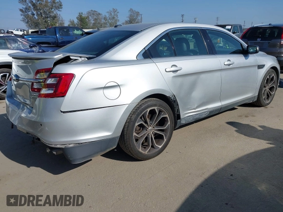 2014 Ford Taurus SHO with VIN 1FAHP2KT8EG123342, listed as a IAAI auction lot 42095390 with 142,957 mi miles. Bid and sale history available at carsss.com. Image 4.