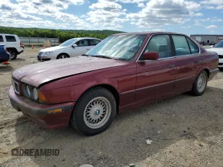 1995 BMW 5 Series 525i z VIN WBAHD632XSGK86387, wystawiony jako Copart lot #58245795 z przebiegiem 168 925 mil mil oraz Czysty tytuł • Clean title. Historia ofert i sprzedaży dostępna na DreamBid. Obrazek 1.