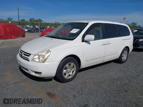 2006 Kia Sedona LX with VIN KNDMB233866052026, listed as a IAAI auction lot 42095980 with 230,320 mi miles. Bid and sale history available at carsss.com. Image 2.