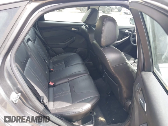 2014 Ford Focus Titanium with VIN 1FADP3N20EL422693, listed as a IAAI auction lot 42060024 with 97,371 mi miles and . Bid and sale history available at DreamBid. Image 8.