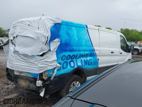 2020 Ford Transit Cargo with VIN 1FTBR1Y88LKB48985, listed as a IAAI auction lot 42009136 with 127,124 mi miles and . Bid and sale history available at DreamBid. Image 4.