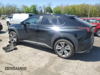 2023 Subaru Solterra Limited z VIN JTMABABA1PA024533, wystawiony jako Copart lot #54735625 z przebiegiem 7604 mil mil oraz Szkody całkowita. Historia ofert i sprzedaży dostępna na DreamBid. Obrazek 2.
