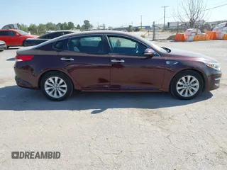 2017 Kia Optima LX with VIN 5XXGT4L33HG129749, listed as a IAAI auction lot 40360996 with 174,803 mi miles. Bid and sale history available at carsss.com. Image 13.