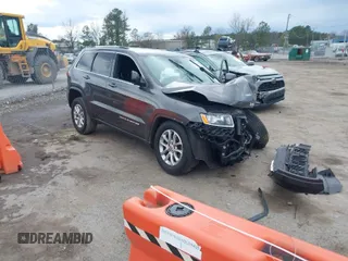 2014 Jeep Grand Cherokee Laredo with VIN 1C4RJEAG1EC573704, listed as a IAAI auction lot 41864355 with 141,970 mi miles. Bid and sale history available at carsss.com. Image 1.