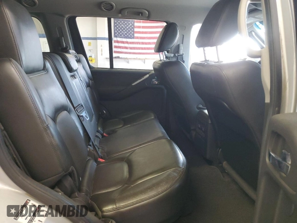 2012 Nissan Pathfinder Silver Edition z VIN 5N1AR1NB7CC629750, wystawiony jako Copart lot #61209965 z przebiegiem 164 479 mil mil oraz Szkoda całkowita • Salvage title. Historia ofert i sprzedaży dostępna na DreamBid. Obrazek 11.