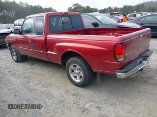 1999 Mazda B-Series 2WD Truck SE with VIN 4F4YR16X9XTM36395, listed as a IAAI auction lot 41398685 with 256,929 mi miles. Bid and sale history available at carsss.com. Image 3.