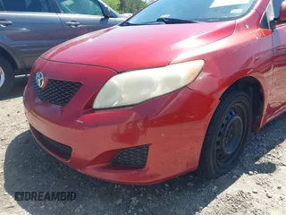 2009 Toyota Corolla with VIN JTDBL40E999080233, listed as a IAAI auction lot 41995330 with 249,789 mi miles. Bid and sale history available at carsss.com. Image 6.