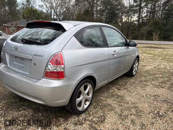 2007 Hyundai Accent SE with VIN KMHCN36C47U005847, listed as a Copart auction lot 46369725 with 148,790 mi miles and Clean Title. Bid and sale history available at carsss.com. Image 4.
