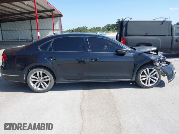 2019 Volkswagen Passat 2.0T Wolfsburg Edition with VIN 1VWLA7A30KC009646, listed as a IAAI auction lot 39842320 with 101,006 mi miles. Bid and sale history available at carsss.com. Image 14.