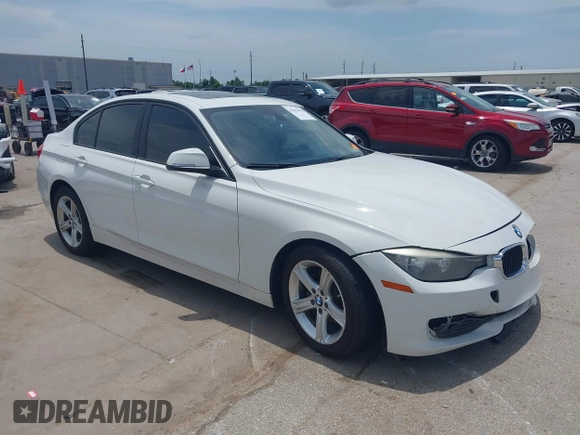 2013 BMW 3 Series 320i with VIN WBA3B1C50DK129576, listed as a IAAI auction lot 42393038 with 160,370 mi miles and . Bid and sale history available at DreamBid. Image 1.