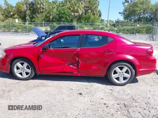 2013 Dodge Avenger SE with VIN 1C3CDZAB6DN626235, listed as a IAAI auction lot 42009562 with 160,910 mi miles and . Bid and sale history available at DreamBid. Image 14.