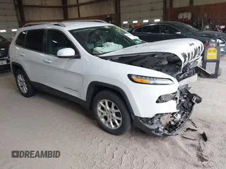 2014 Jeep Cherokee Altitude with VIN 1C4PJMCB7EW186432, listed as a IAAI auction lot 42076018 with 150,186 mi miles and . Bid and sale history available at DreamBid. Image 1.