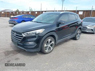 2016 Hyundai Tucson Limited with VIN KM8J33A27GU181240, listed as a IAAI auction lot 42183028 with 104,557 mi miles. Bid and sale history available at carsss.com. Image 17.