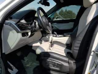 2018 BMW X6 xDrive50i with VIN 5UXKU6C56J0Z66652, listed as a Copart auction lot 74816694 with 56,229 mi miles and Salvage Title. Bid and sale history available at carsss.com. Image 7.