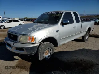 1998 Ford F-250 with VIN 2FTPX2867WCA21458, listed as a Copart auction lot 49632105 with 145,392 mi miles and Salvage title. Bid and sale history available at DreamBid. Image 1.