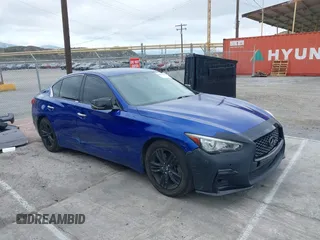 2014 Infiniti Q50 z VIN JN1BV7AP6EM689012, wystawiony jako IAAI lot #42063216 z przebiegiem 114 785 mil mil oraz . Historia ofert i sprzedaży dostępna na DreamBid. Obrazek 1.