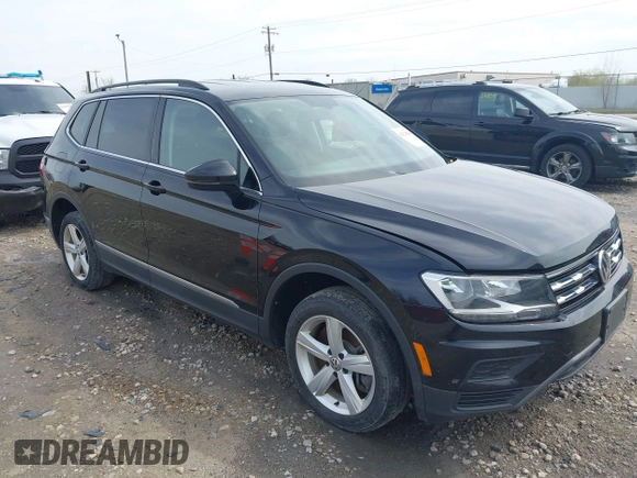 2021 Volkswagen Tiguan SE with VIN 3VV2B7AX4MM050282, listed as a IAAI auction lot 42124808 with 80,082 mi miles and . Bid and sale history available at DreamBid. Image 1.