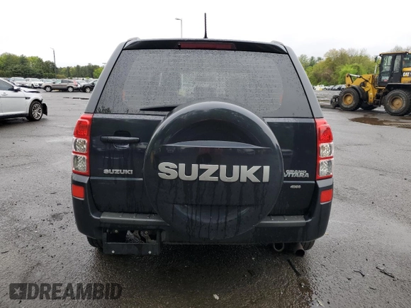 2006 Suzuki Grand Vitara Luxury with VIN JS3TD947364101307, listed as a Copart auction lot 55037585 with 198,616 mi miles and Salvage title. Bid and sale history available at DreamBid. Image 6.