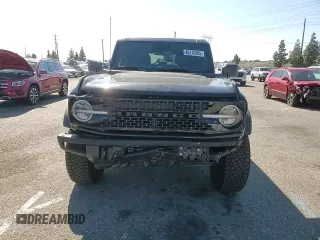 2024 Ford Bronco Wildtrak z VIN 1FMEE2BP1RLA54539, wystawiony jako Copart lot #46310905 z przebiegiem 12 545 mil mil oraz Szkody całkowita. Historia ofert i sprzedaży dostępna na DreamBid. Obrazek 12.