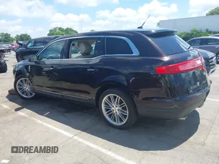 2014 Lincoln MKT EcoBoost z VIN 2LMHJ5AT9EBL53512, wystawiony jako IAAI lot #42330434 z przebiegiem 128 950 mil mil oraz . Historia ofert i sprzedaży dostępna na DreamBid. Obrazek 14.