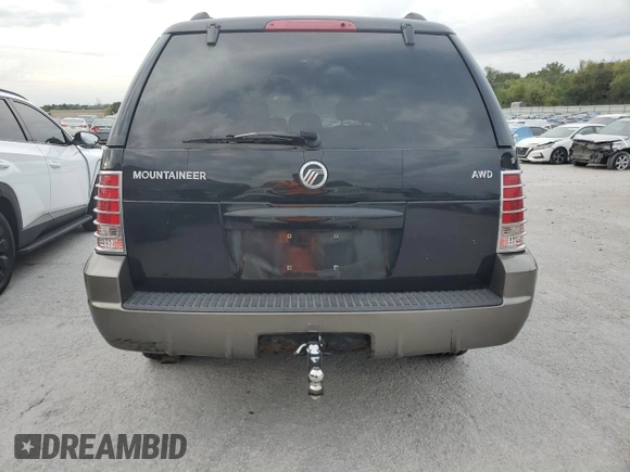 2004 Mercury Mountaineer Convenience z VIN 4M2ZU86K44ZJ39109, wystawiony jako Copart lot #70077964 z przebiegiem 188 706 mil mil oraz Nie do naprawy • Non repairable. Historia ofert i sprzedaży dostępna na DreamBid. Obrazek 6.
